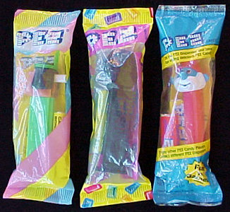 The Flash Pez Dispenser In cello bag with 2 rolls Pez Candy refills 